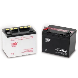 Two motorcycle batteries, one white and one black, are shown side-by-side. The white battery has a black top with yellow terminals and is labeled "U1/9 (12V24Ah/10HR)". The black battery has red and black accents and is labeled "U1L-7 (12V18Ah/10HR) SUPER MF". The brand name "OUTDO" is visible on both batteries.